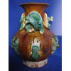 a rare tang sancai glazed qilong vase