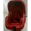 infant carseat-babydoes in red