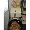 mesin pengupas batok kelapa