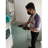 office boy/girl dusting ruangan dokter luar loby utama fast lab