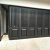 pintu garasi lipat minimalis kayu dan besi balikpapan-1