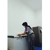 office boy/girl dusting freezer 21/6/2022