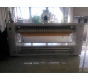 mesin roll ironner ( setrika sprai )