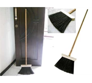 natural wooden brooms