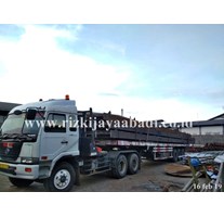 JASA TRANSPORTASI TRAILER TRUK KARGO | PT. RJA TRANSPORT