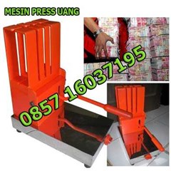 mesin press uang