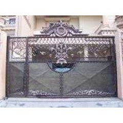 pintu pagar dan logo huruf timbul