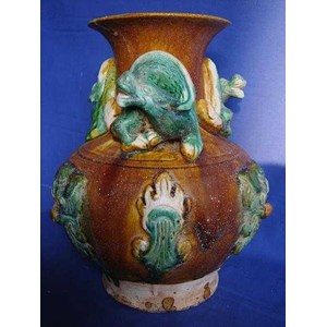 a rare tang sancai glazed qilong vase