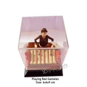 playing red gamelan ( small souvenir) - above