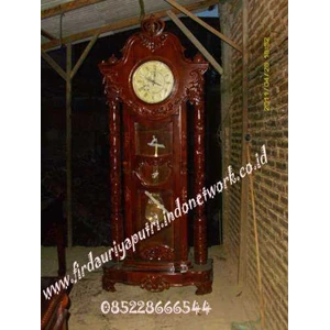 jam mahkota tiang ukir