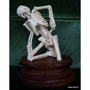 human skeleton carving - sitting
