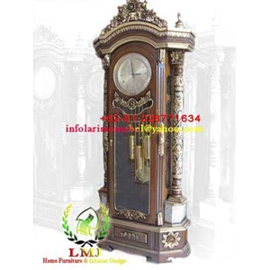 almari jam hias kerang