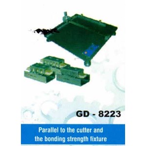 parallel to the cutter and the bonding strength fixture