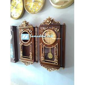 jam dinding ukiran