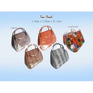 tas oval kulit ular