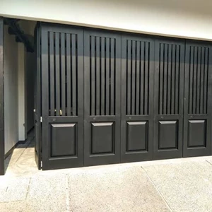 pintu garasi lipat minimalis kayu dan besi banjarmasin-3