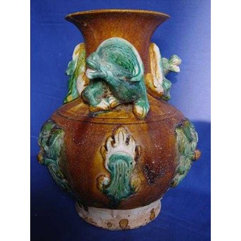 A Rare Tang Sancai Glazed Qilong Vase