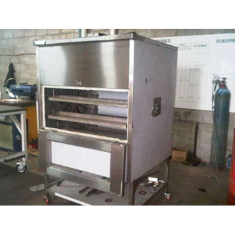 Oven ayam revolver