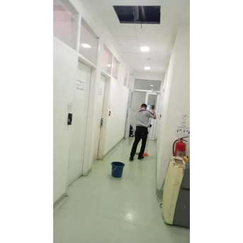 office boy/girl sweping moping area ruang pembuangan sampah medis