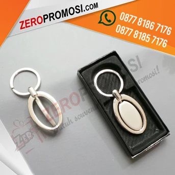 souvenir gantungan kunci besi oval putar custom logo-5