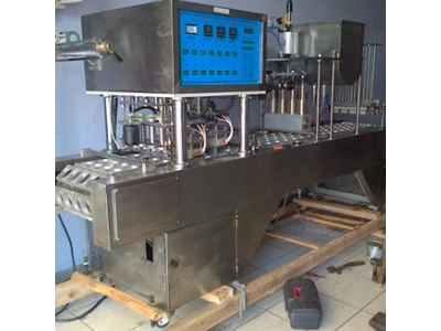 Mesin sealer cup 4 line AUTOMATIC CUP SEALER 4 LINE PNEUMATIC SYSTEM