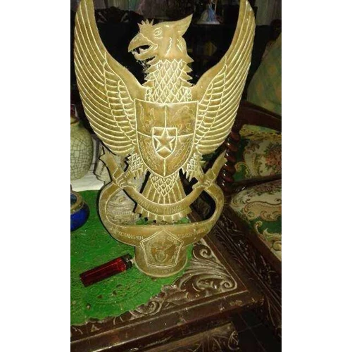 Mengepakkan yang melambangkan garuda burung sayapnya Burung Garuda